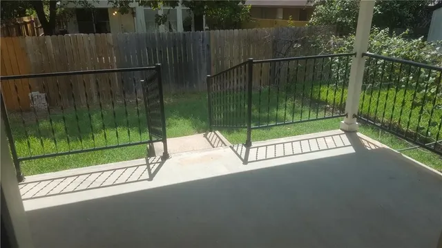 a view of a building with a tree