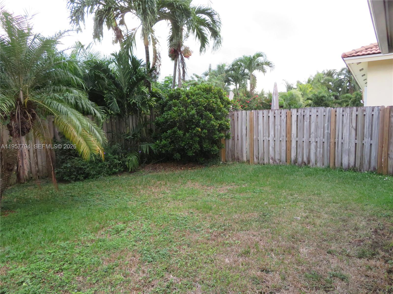 15764 Southwest 101st Street Miami, FL 33196 - Photo 27 of 27 a view of backyard with palm trees