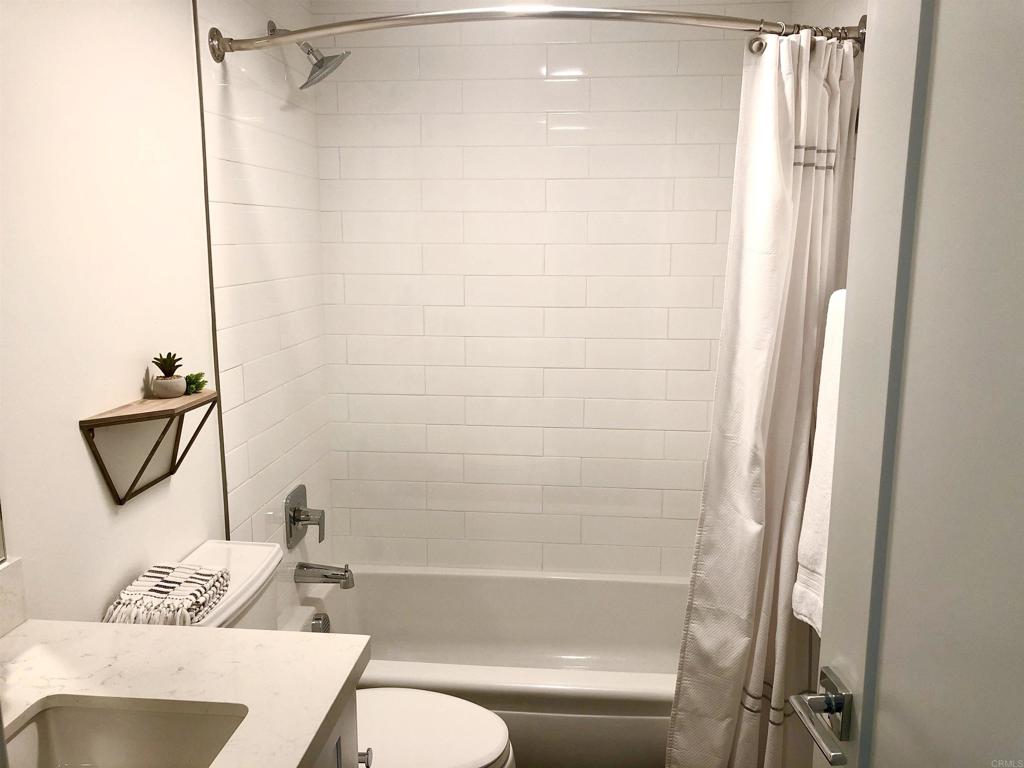 1903 South Myers Street, Unit 3 Oceanside, CA 92054 - Photo 14 of 30 a bathroom with a shower a toilet and a sink