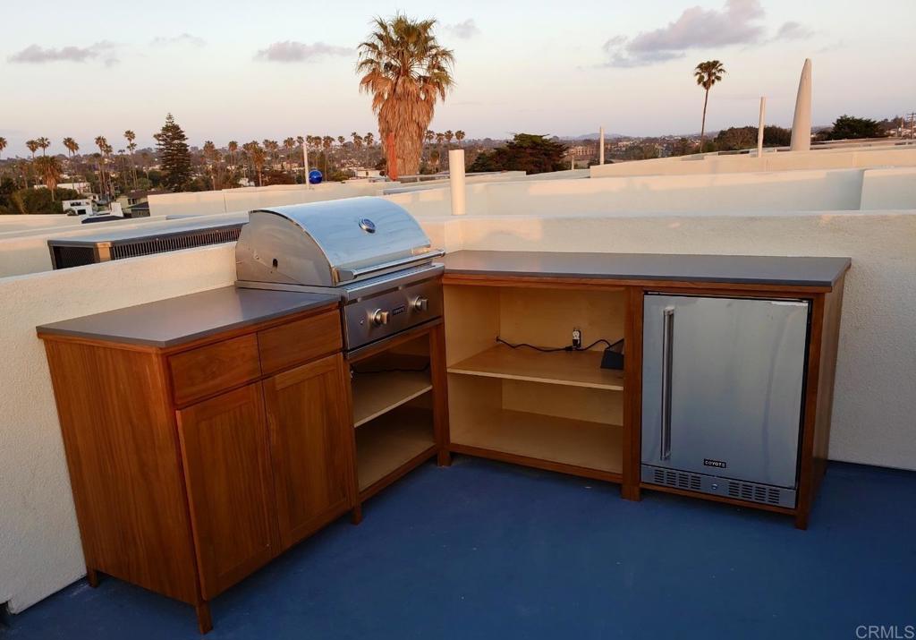 1903 South Myers Street, Unit 3 Oceanside, CA 92054 - Photo 19 of 30 a view of a room with water heater and a table