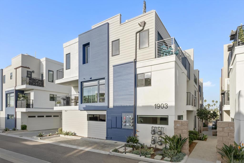 1903 South Myers Street, Unit 3 Oceanside, CA 92054 - Photo 24 of 30 a front view of a building with a garden