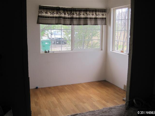 15410 Toll Road Reno, NV 89521 - Photo 6 of 13 a view of an empty room with a window