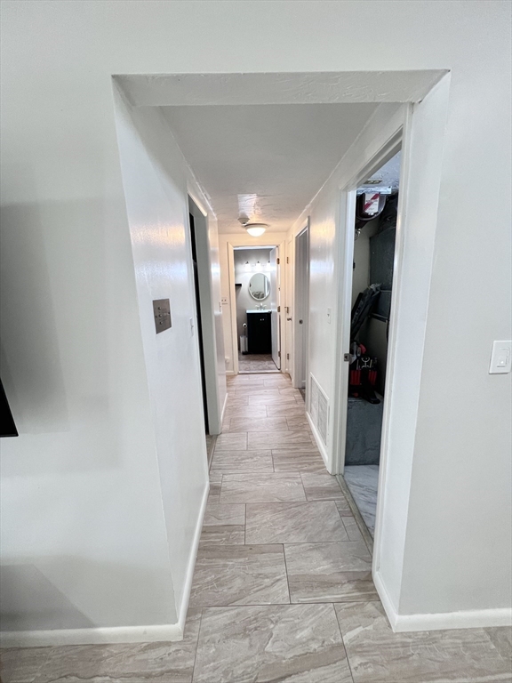 39 Christopher Drive, Unit B Stoughton, MA 02072 - Photo 20 of 38 a view of a hallway