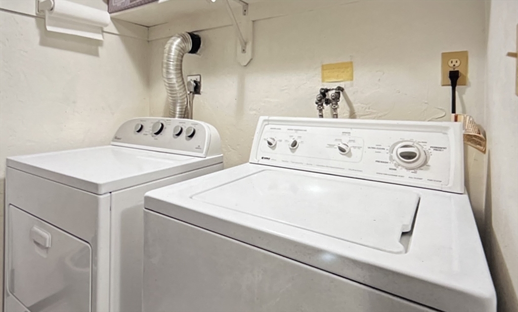 39 Christopher Drive, Unit B Stoughton, MA 02072 - Photo 26 of 38 a utility room with dryer and washer