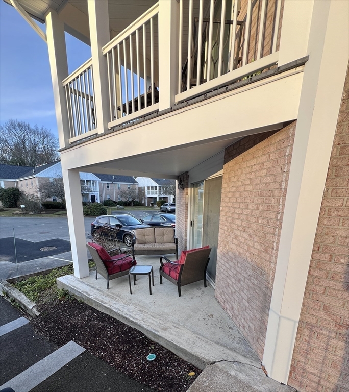 39 Christopher Drive, Unit B Stoughton, MA 02072 - Photo 27 of 38 a view of living room with furniture and a rug