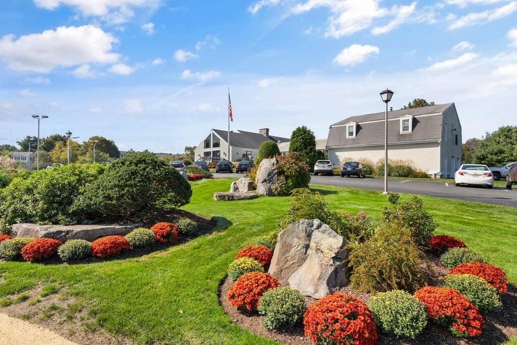 39 Christopher Drive, Unit B Stoughton, MA 02072 - Photo 31 of 38 a view of a garden with a flower garden