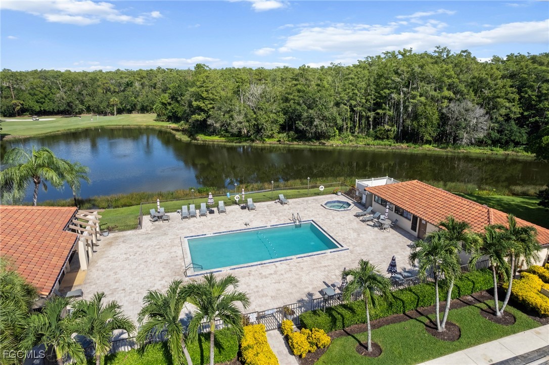 13276 White Marsh Lane, Unit 3533 Fort Myers, FL 33912 - Photo 2 of 31 an aerial view of a house with outdoor space and lake view
