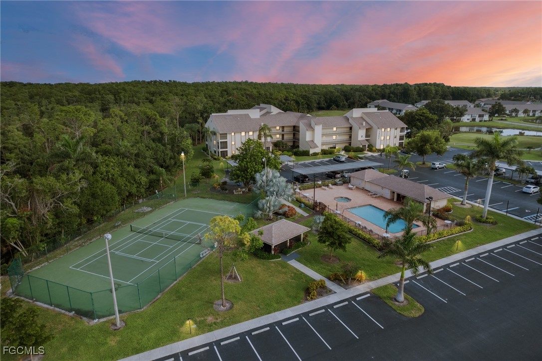 13276 White Marsh Lane, Unit 3533 Fort Myers, FL 33912 - Photo 27 of 31 a view of a tennis court
