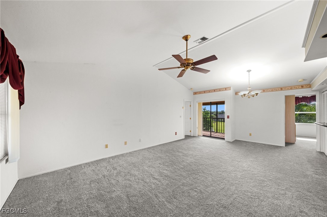 13276 White Marsh Lane, Unit 3533 Fort Myers, FL 33912 - Photo 8 of 31 an empty room with a empty space and a ceiling fan