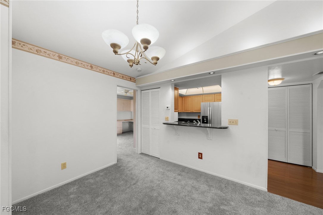 13276 White Marsh Lane, Unit 3533 Fort Myers, FL 33912 - Photo 10 of 31 a view of a livingroom with a flat screen tv