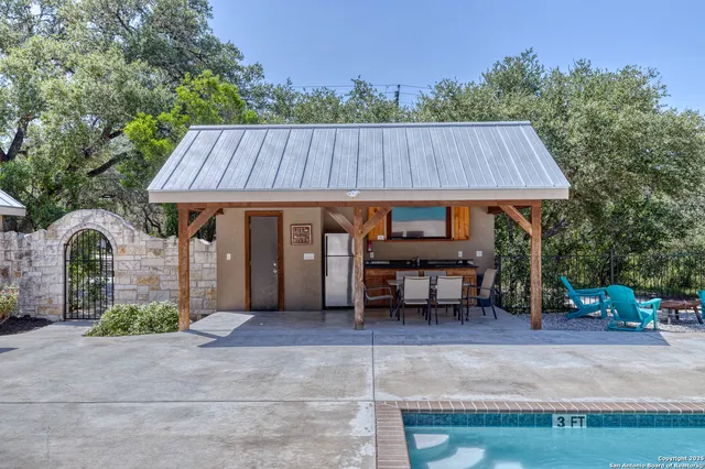 a view of a table and chairs in patio