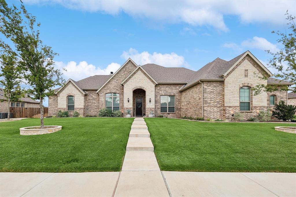 4618 Wildflower Way Midlothian, TX 76065 - Photo 1 of 1 a view of a house with a yard