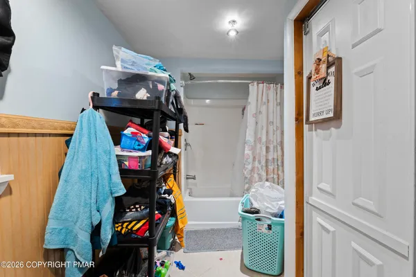 a view of living room with furniture and flowers