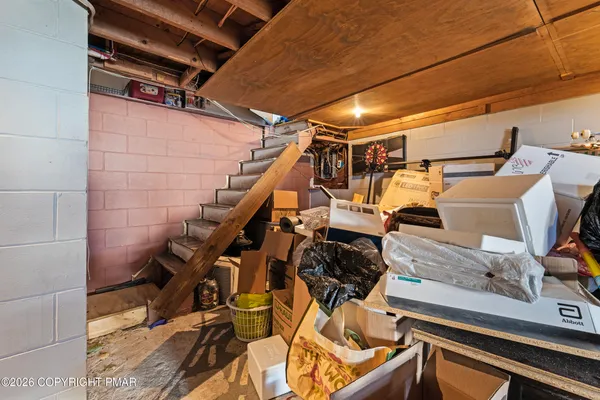 a view of bathroom with a sink and a mirror
