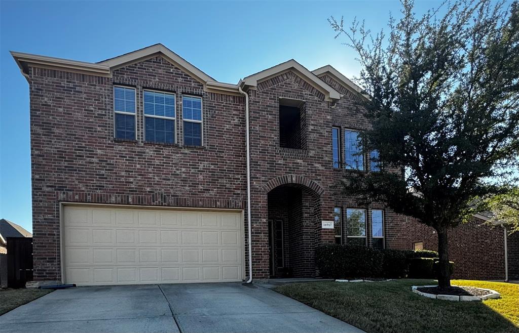 14917 Spruce Street Little Elm, TX 75068 - Photo 11 of 13 a front view of a house with garden