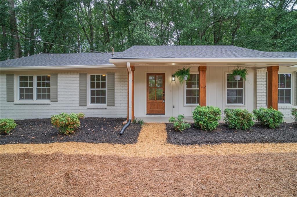3494 Due W Road Northwest Marietta, GA 30064 - Photo 1 of 1 front view of a house with a yard
