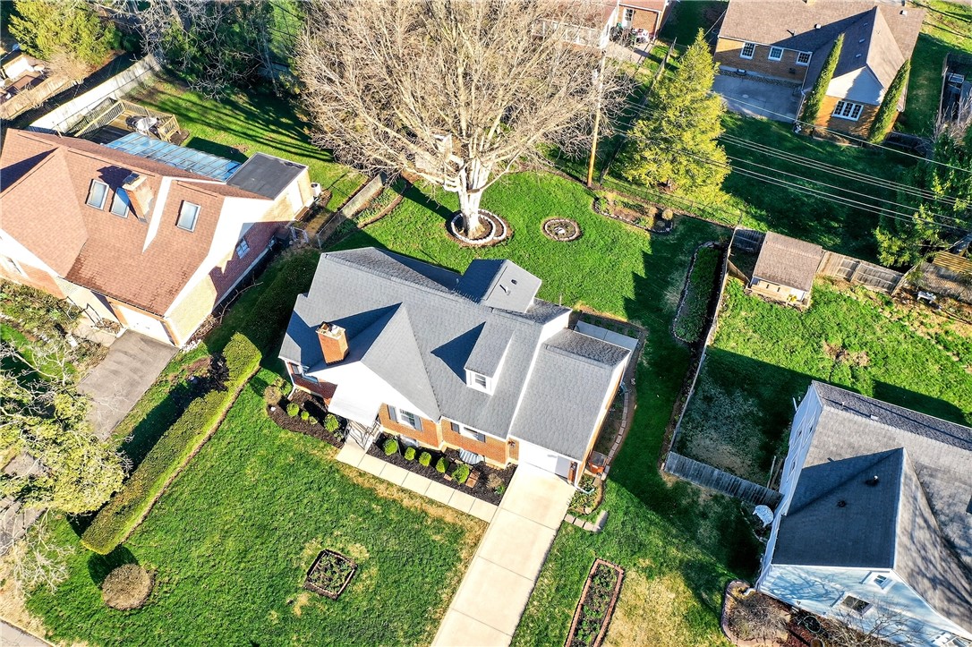 1237 Laurelwood Road Dayton, OH 45409 - Photo 47 of 56 This elevated view captures a home with well-maintained grounds and a convenient driveway.