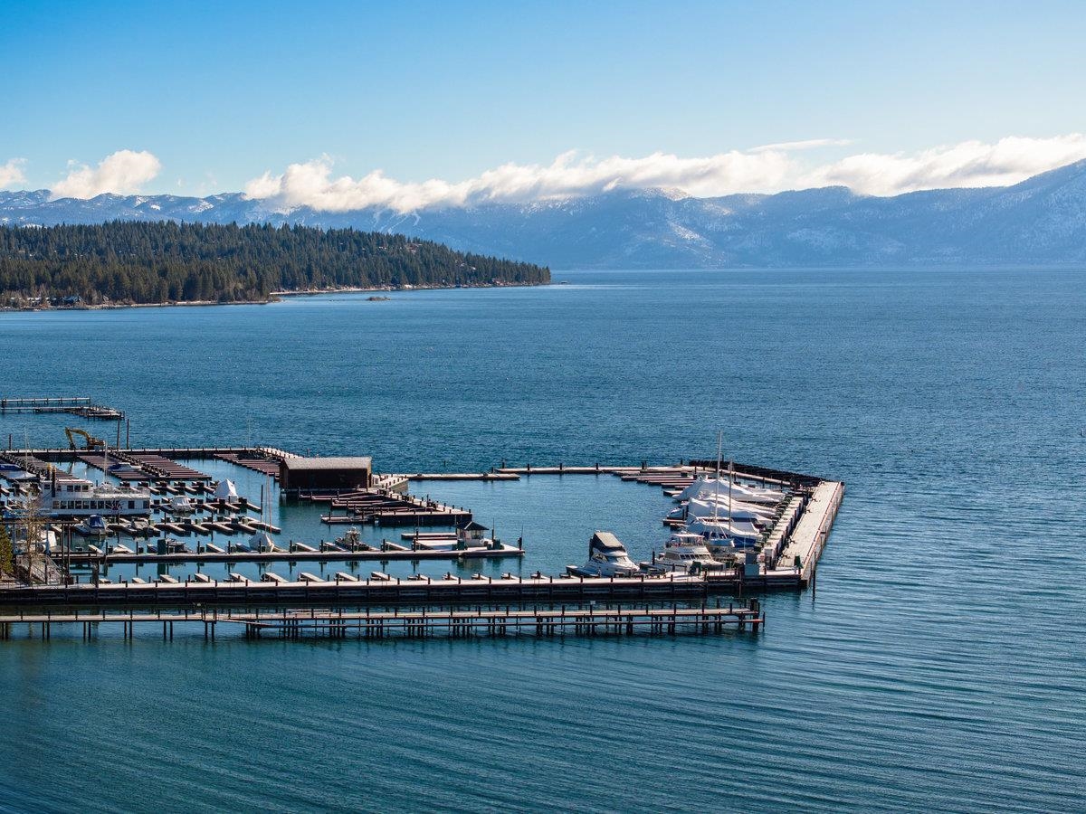 270 North North Lake Boulevard, Unit 39 Tahoe City, CA 96145 - Photo 26 of 28 a view of a lake with a mountain