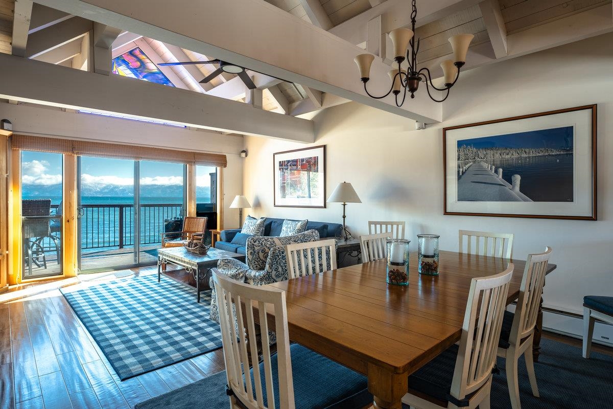 270 North North Lake Boulevard, Unit 39 Tahoe City, CA 96145 - Photo 3 of 28 a view of a dining room with furniture wooden floor and chandelier