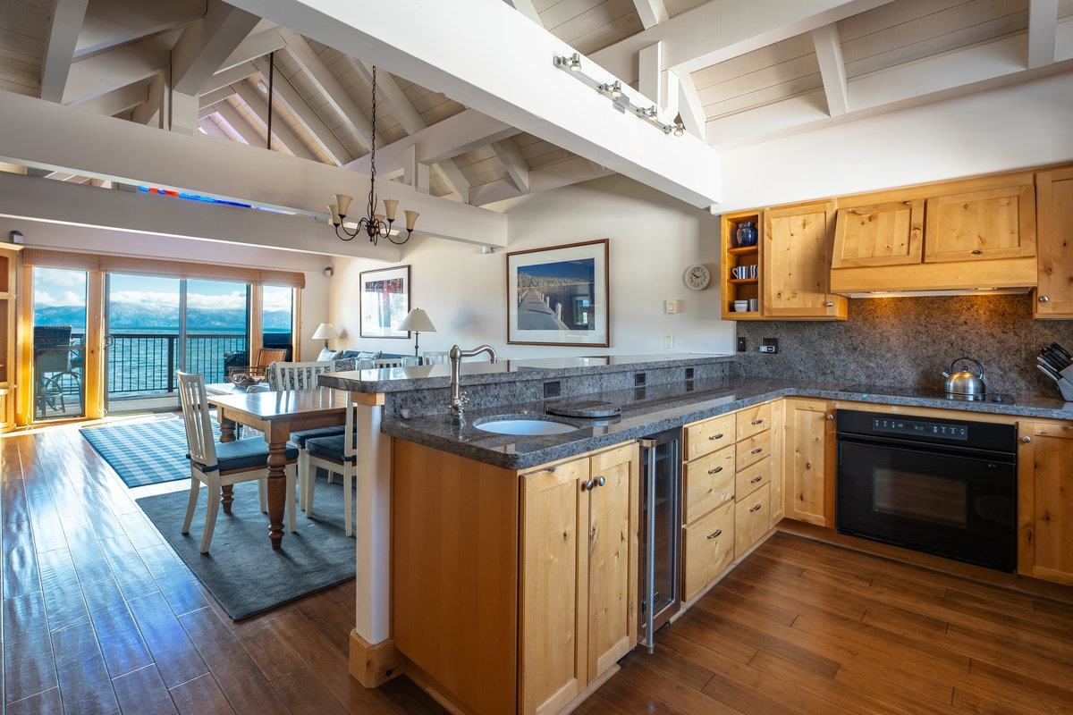 270 North North Lake Boulevard, Unit 39 Tahoe City, CA 96145 - Photo 8 of 28 a kitchen with granite countertop lots of counter top space and dining table
