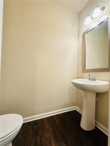 a bathroom with a sink and a toilet