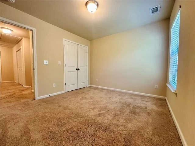 an empty room with a natural light