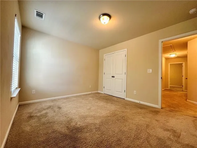 an empty room with a natural light