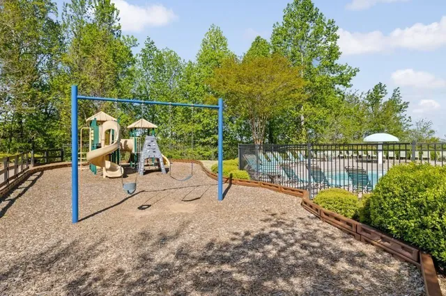 a view of roof deck with a slide