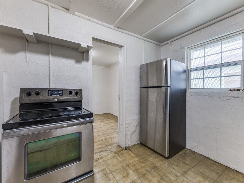 3432 Terrell Street Dallas, TX 75223 - Photo 7 of 7 a kitchen with appliances and a window