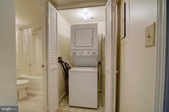 a bathroom with a toilet and a sink