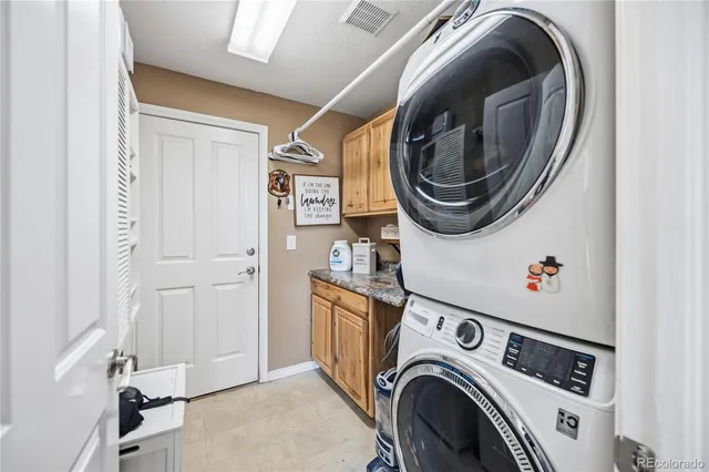 a bathroom with a toilet a sink and a mirror