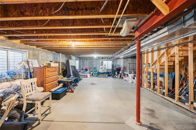 a view of living room filled with furniture and a potted plant