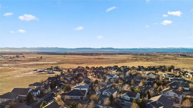 a view of an ocean and city