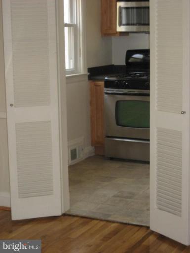 4213 Colonial Road Pikesville, MD 21208 - Photo 3 of 24 View from formal dining room to remodeled kitchen.