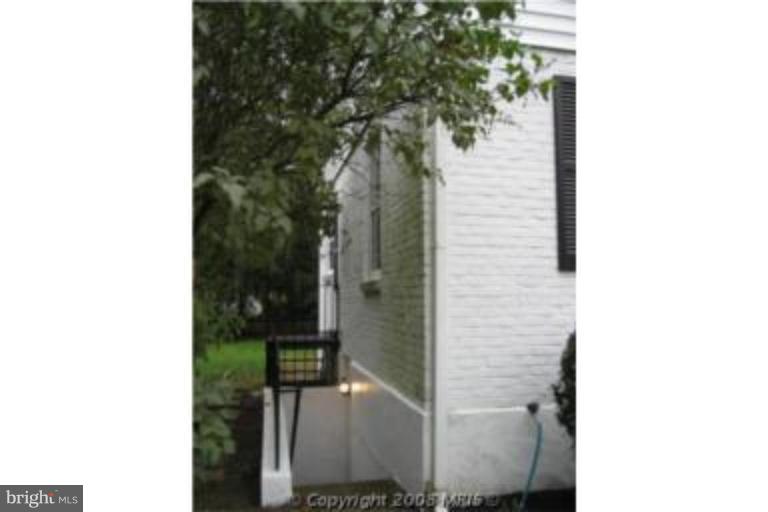 4213 Colonial Road Pikesville, MD 21208 - Photo 10 of 24 Left side of home showing stairs to basement.