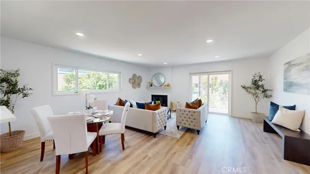 a view of a dining room with furniture and window