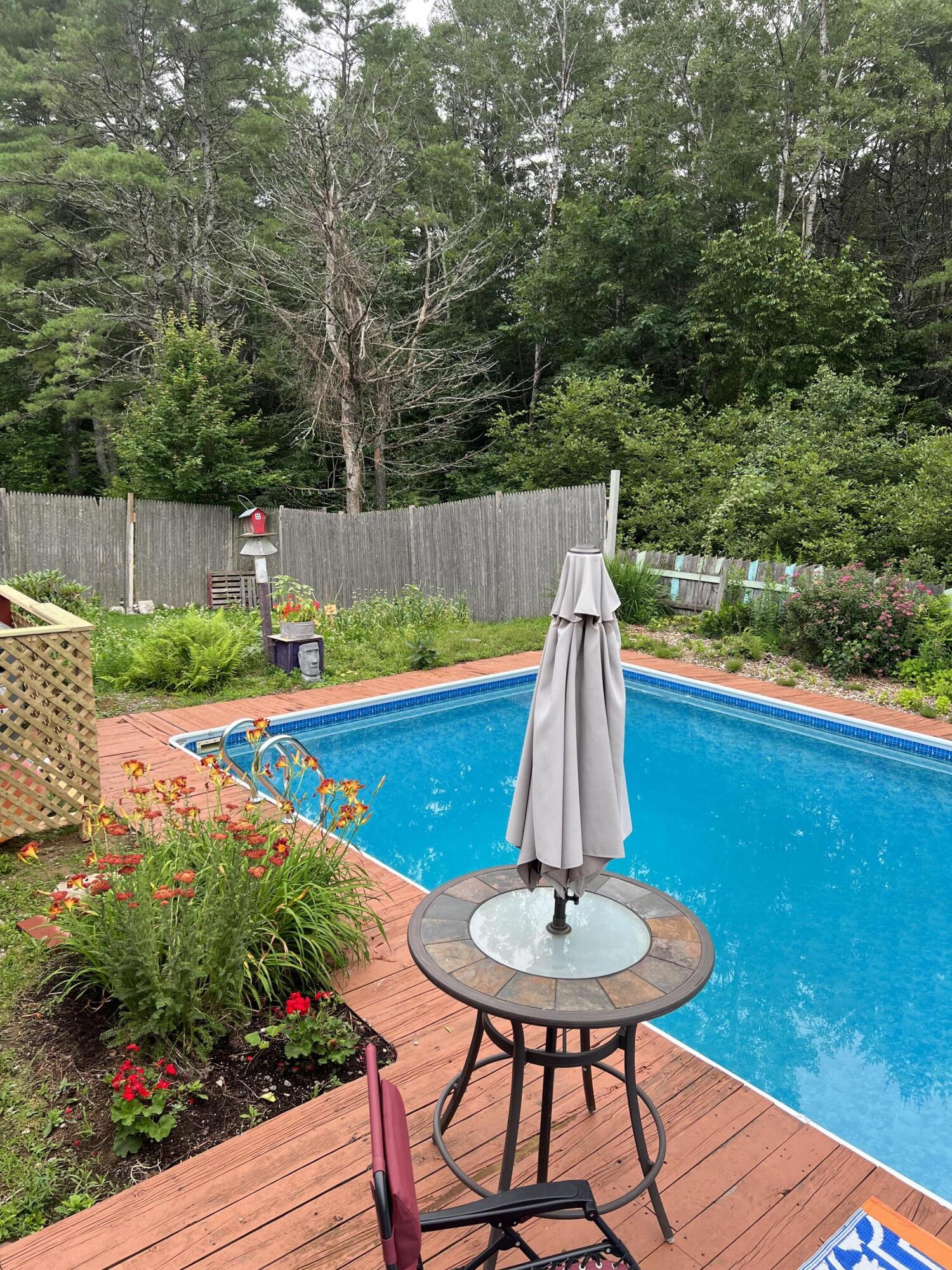 240 Gardiner Road Wiscasset, ME 04578 - Photo 12 of 30 Pool From Sun Porch