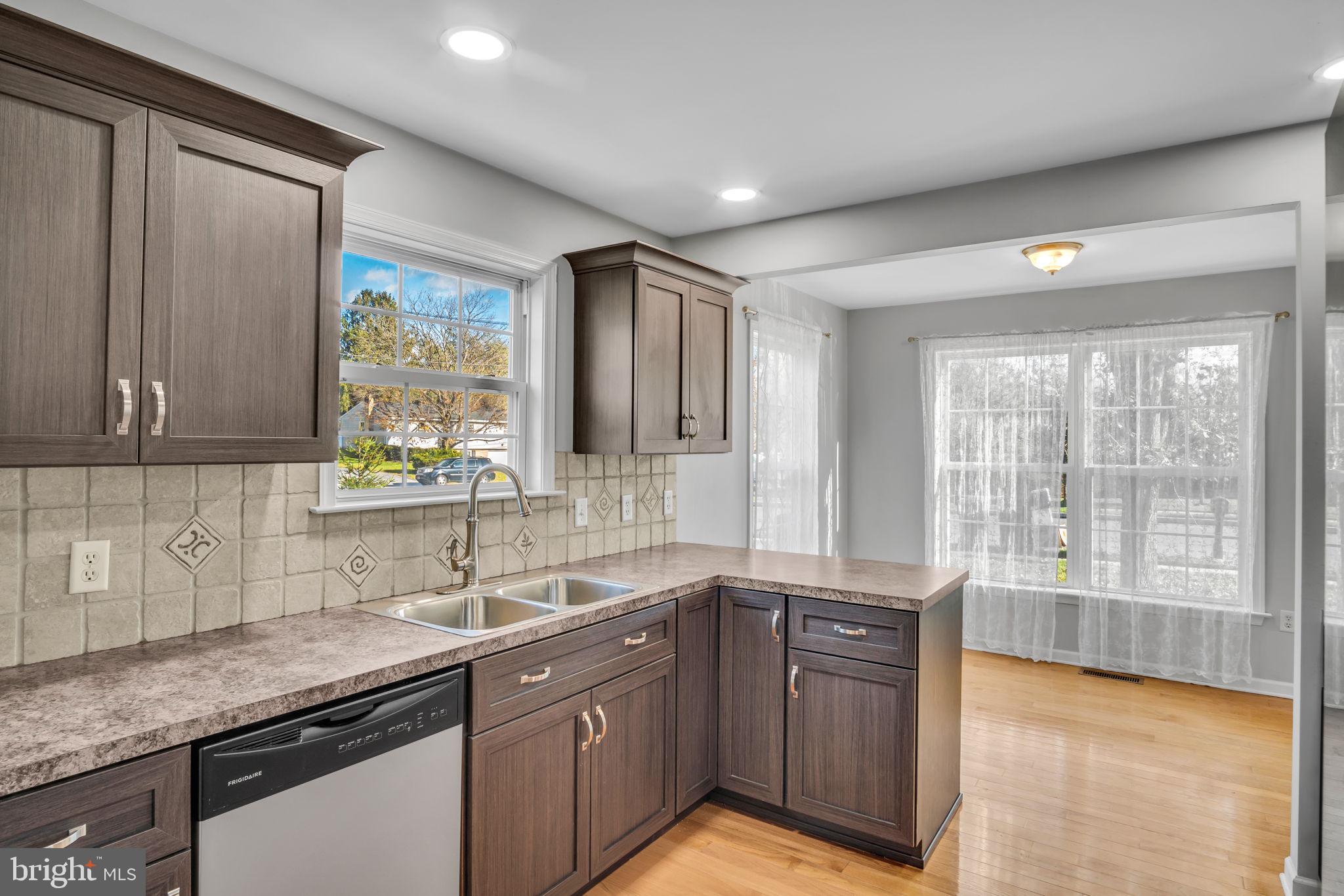 2 Round Ridge Road Mechanicsburg, PA 17055 - Photo 15 of 35 a large kitchen with granite countertop a sink and a window