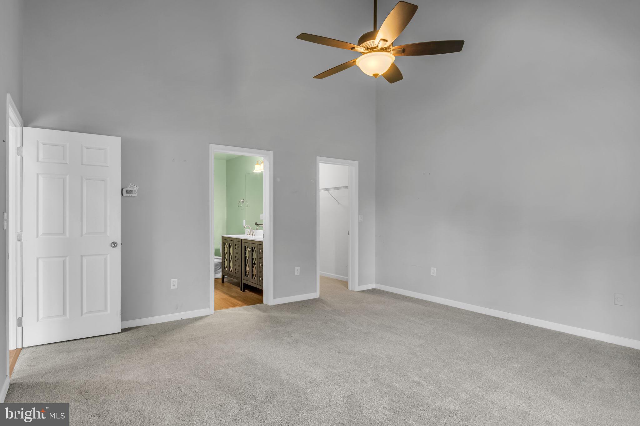 2 Round Ridge Road Mechanicsburg, PA 17055 - Photo 20 of 35 an empty room with closet and a chandelier fan