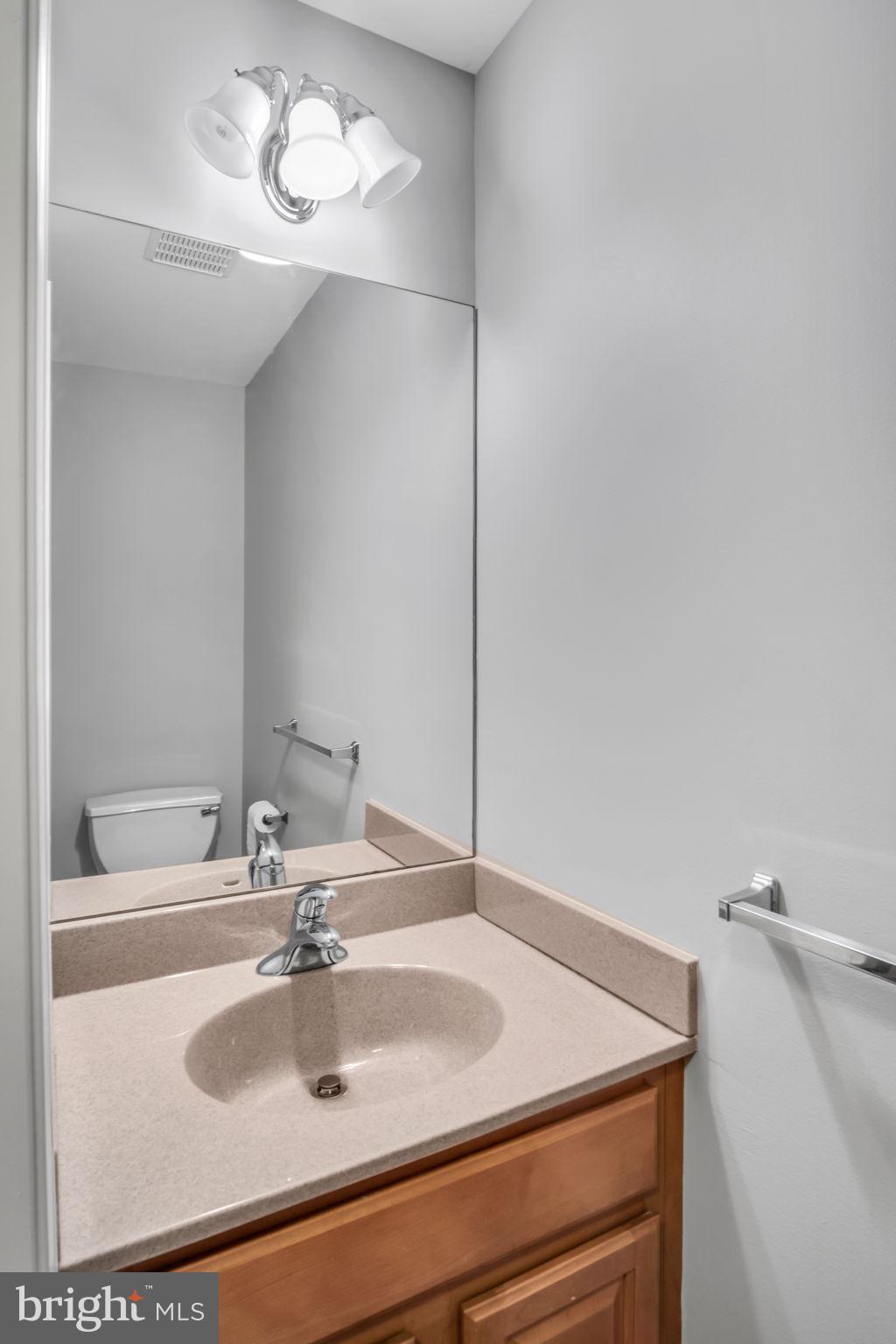 2 Round Ridge Road Mechanicsburg, PA 17055 - Photo 31 of 35 a bathroom with a sink and a mirror