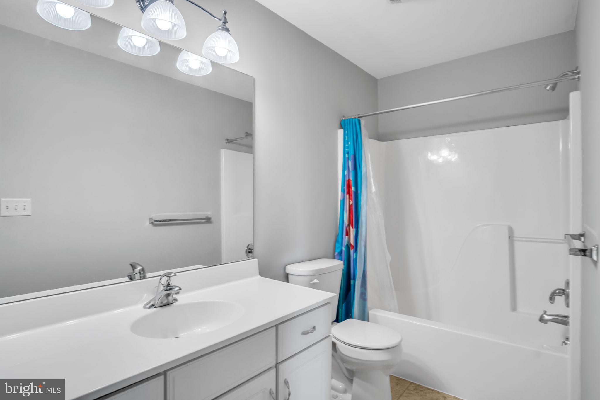 2 Round Ridge Road Mechanicsburg, PA 17055 - Photo 32 of 35 a bathroom with a sink toilet and shower