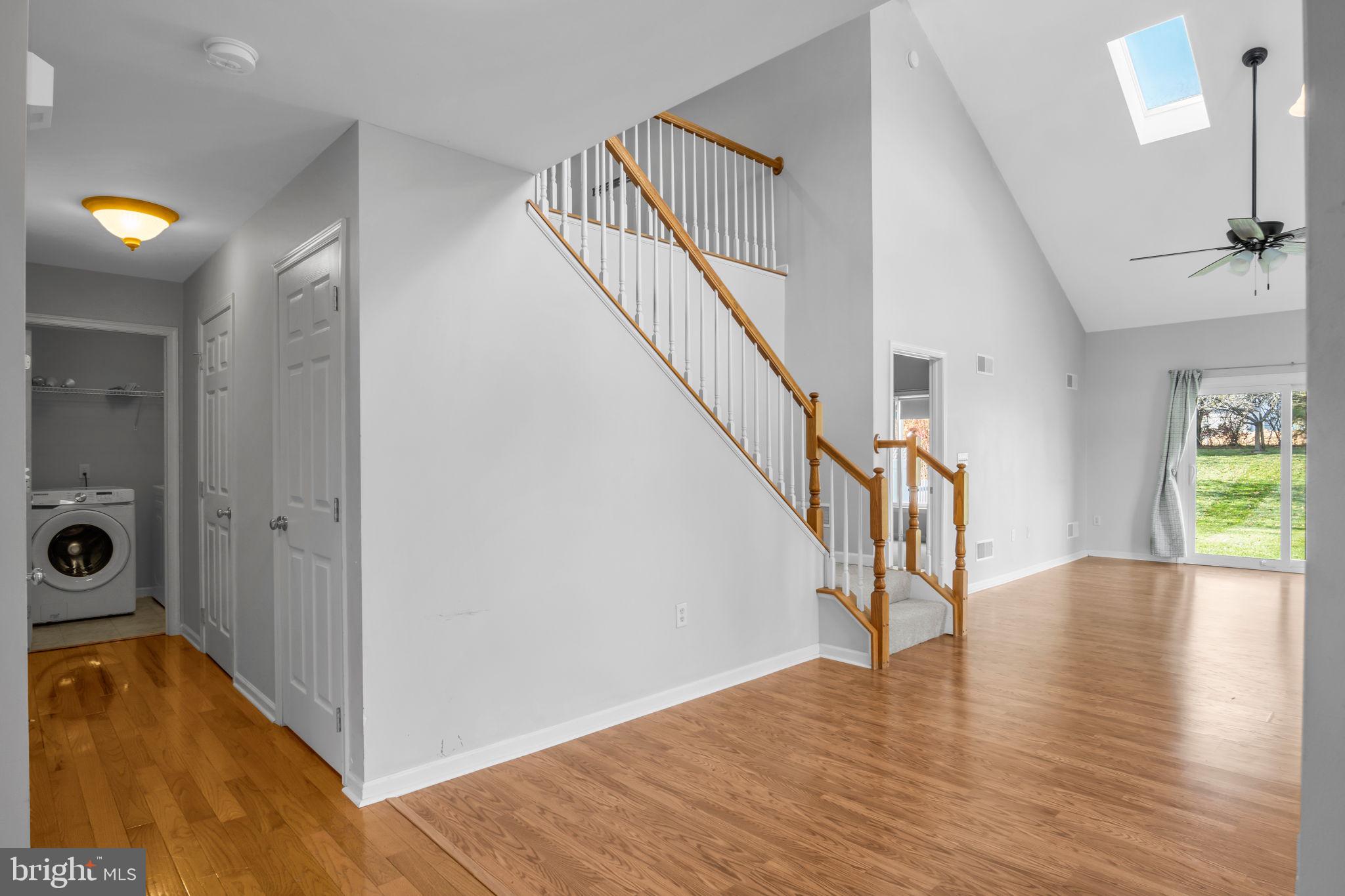2 Round Ridge Road Mechanicsburg, PA 17055 - Photo 8 of 35 a view of an entryway with wooden floor and a living room