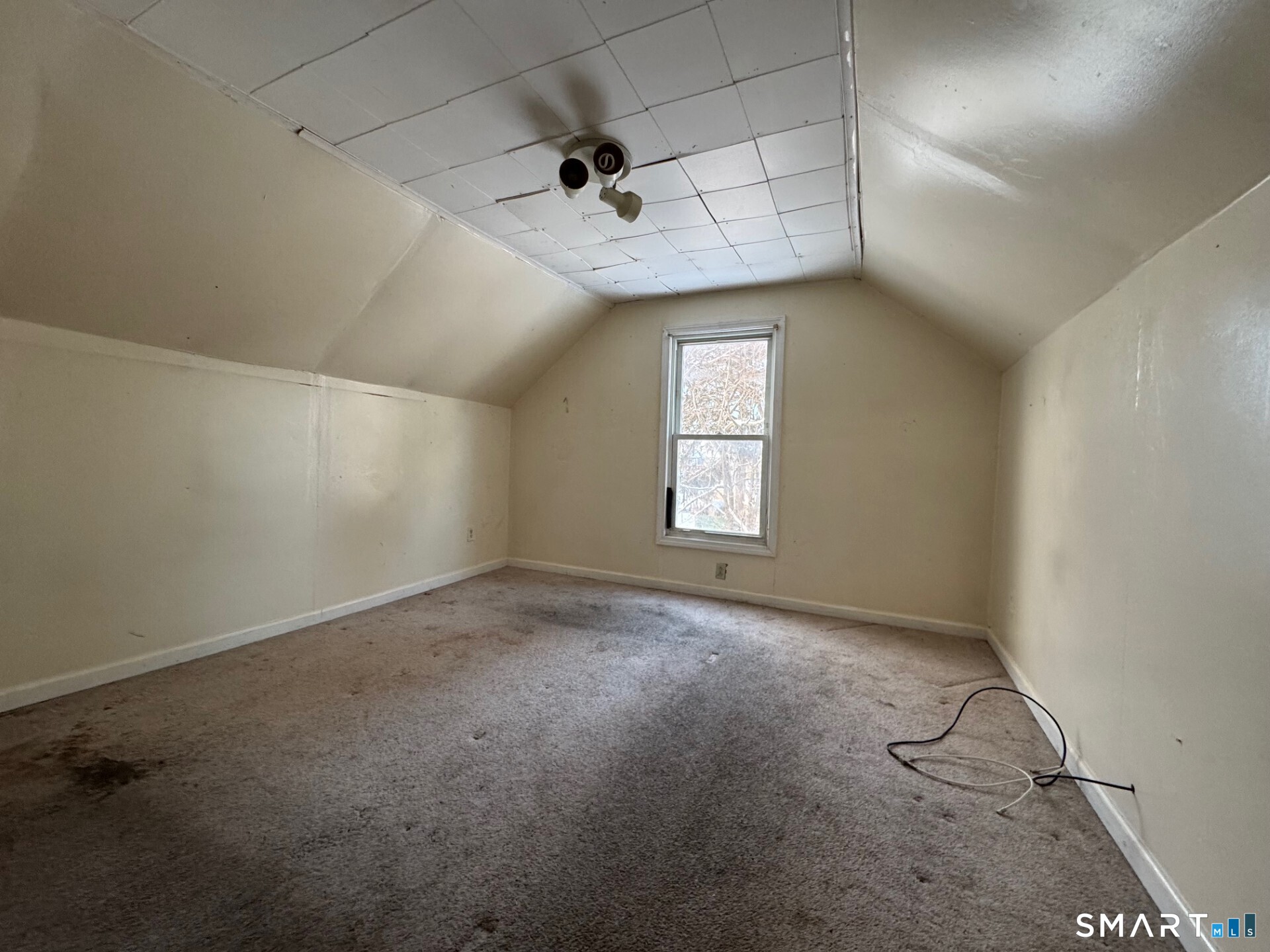 231 School Street Manchester, CT 06040 - Photo 19 of 37 an empty room with a empty space and a window