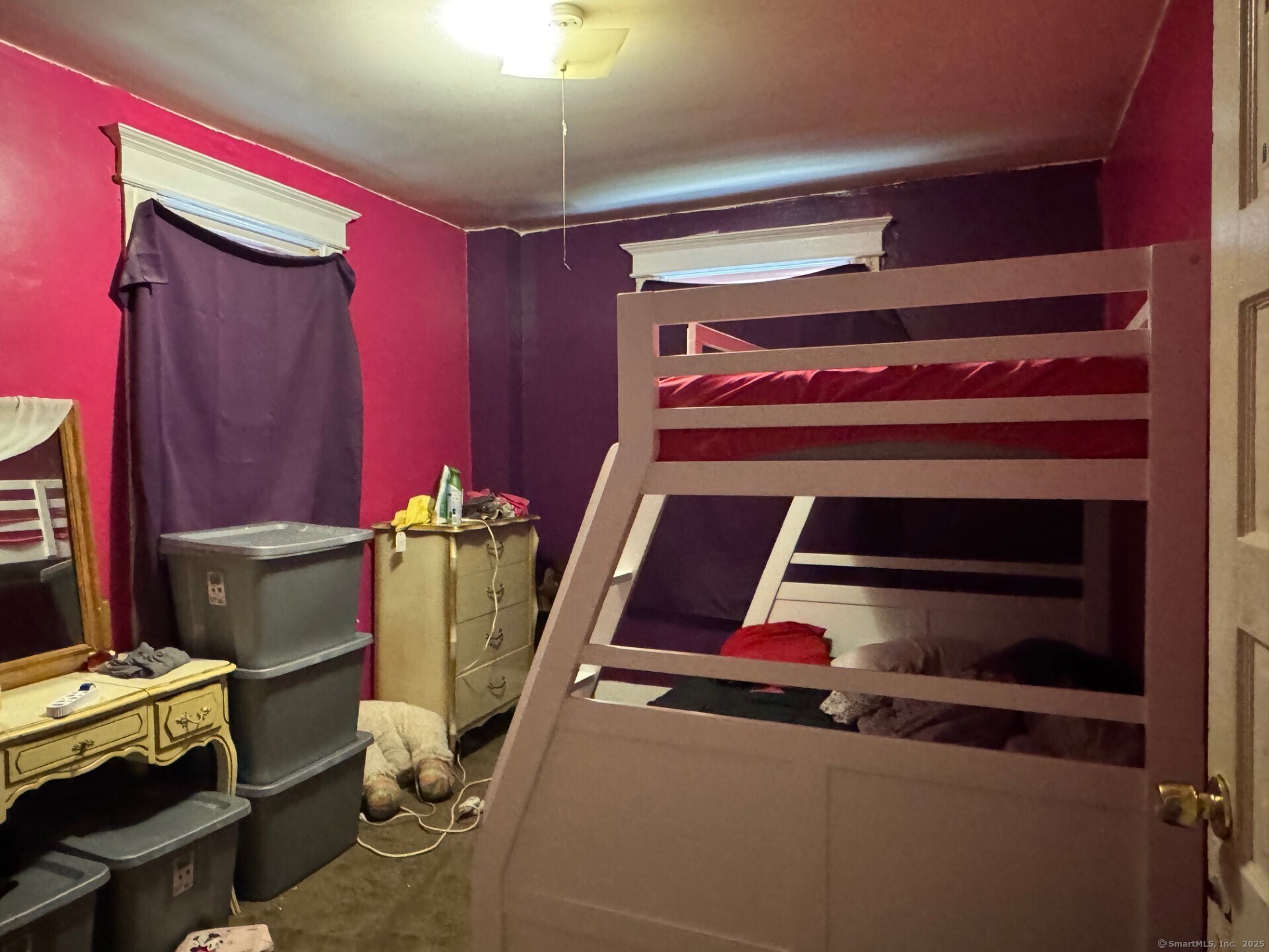 231 School Street Manchester, CT 06040 - Photo 28 of 37 a room with furniture and a flat screen tv