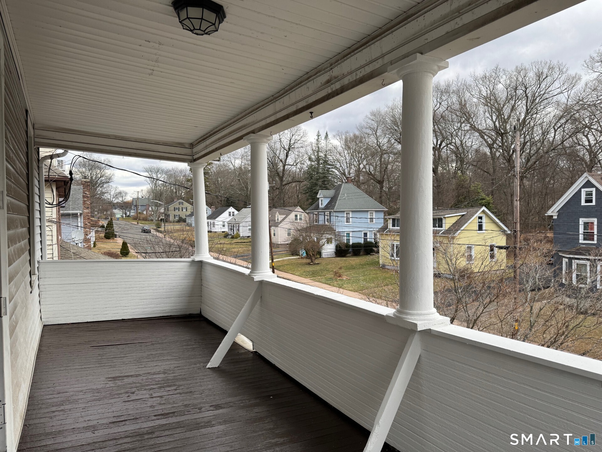 231 School Street Manchester, CT 06040 - Photo 8 of 37 a view of room with a large window and wooden floor