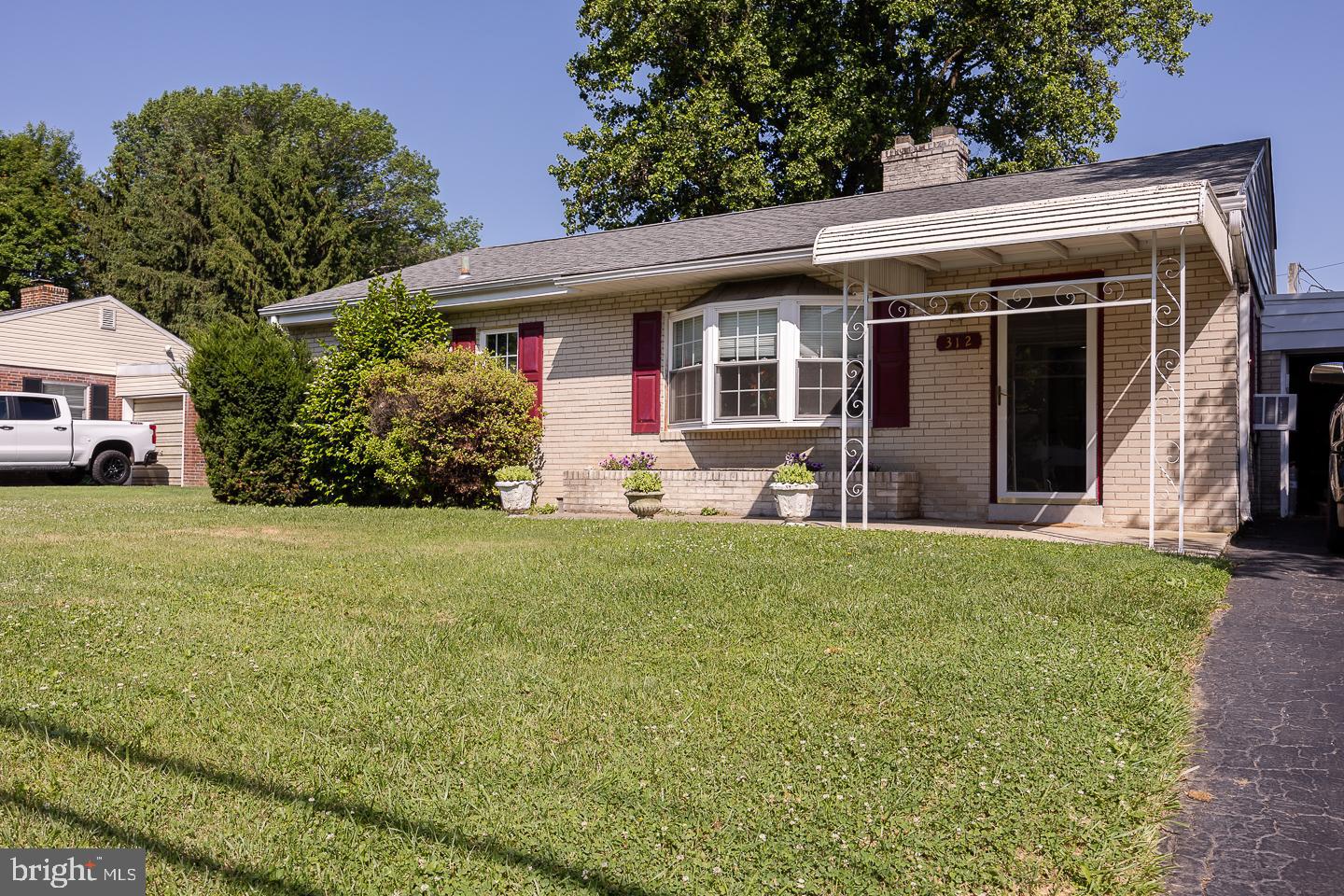 312 Lawrence Road Broomall, PA 19008 - Photo 1 of 23 a front view of house with yard
