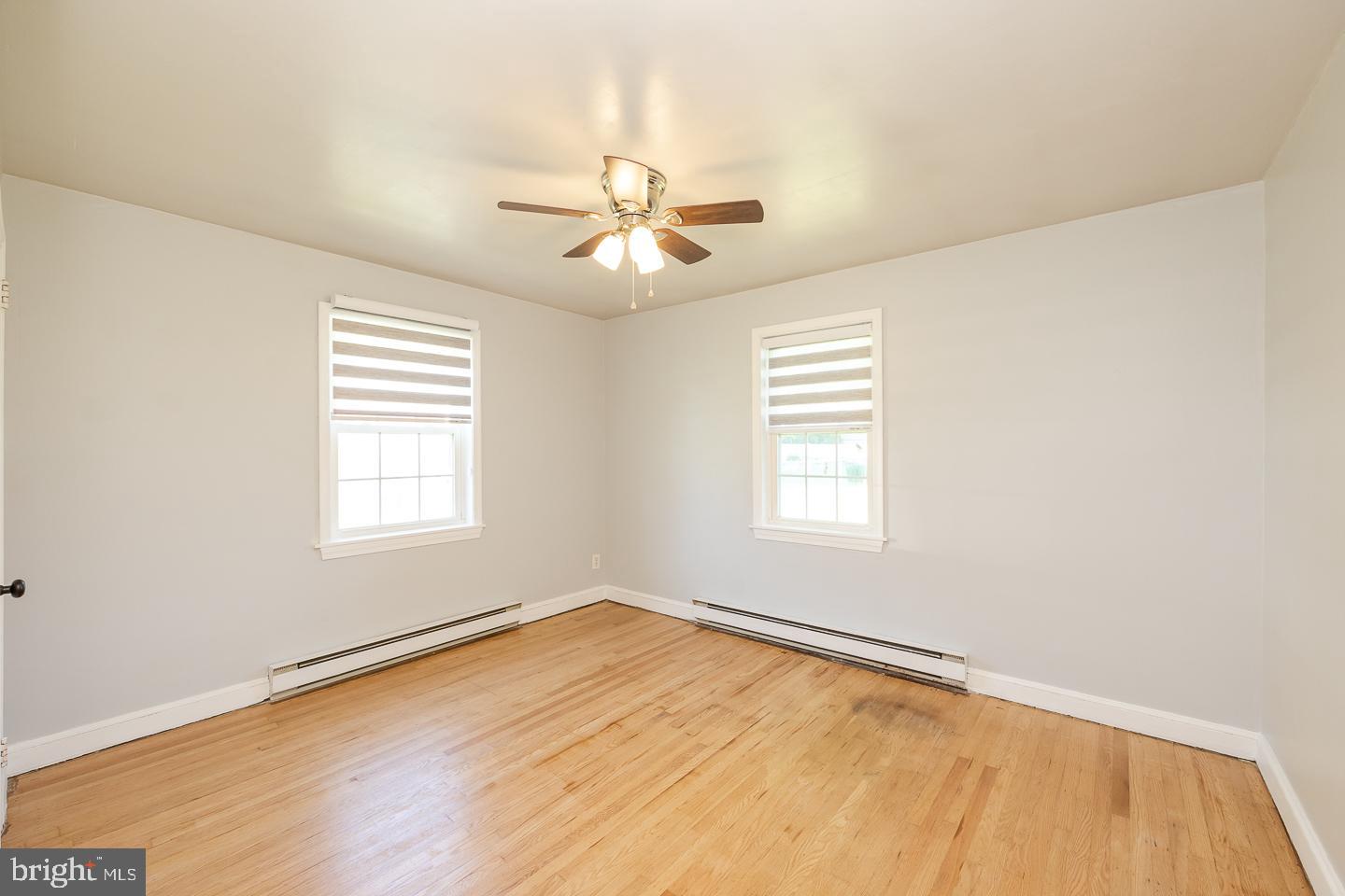 312 Lawrence Road Broomall, PA 19008 - Photo 14 of 23 a view of an empty room with a window