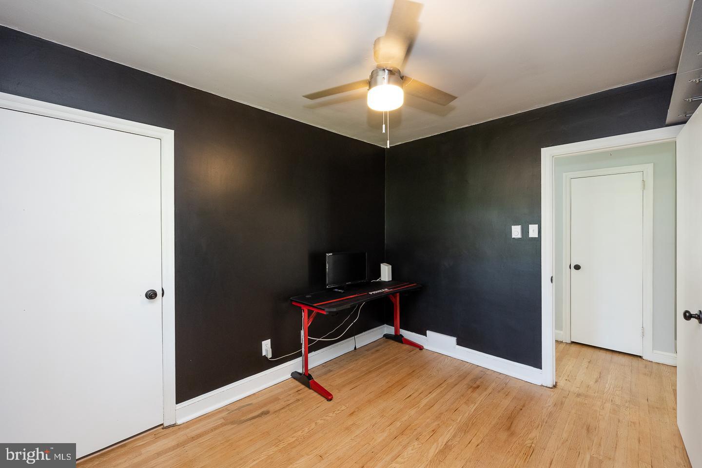 312 Lawrence Road Broomall, PA 19008 - Photo 18 of 23 a view of an empty room with wooden floor