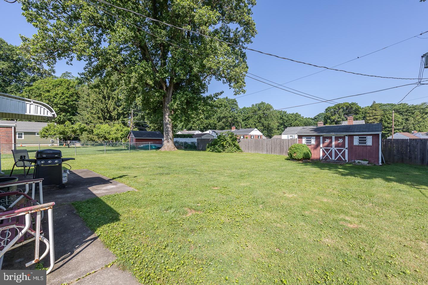 312 Lawrence Road Broomall, PA 19008 - Photo 21 of 23 a view of an house with backyard space and garden