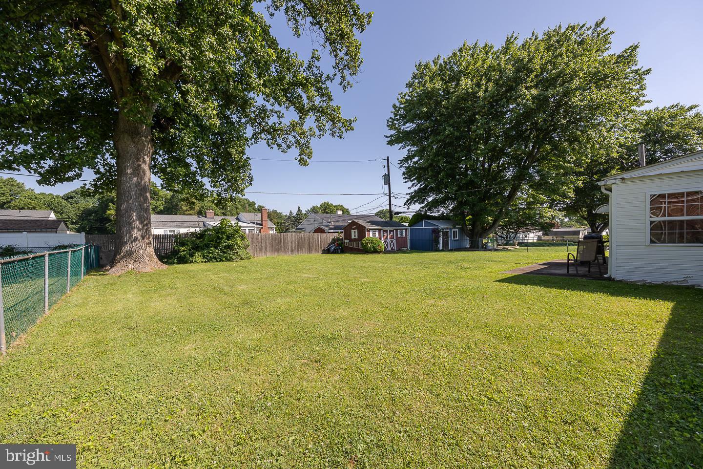 312 Lawrence Road Broomall, PA 19008 - Photo 22 of 23 a view of yard with swimming pool and green space